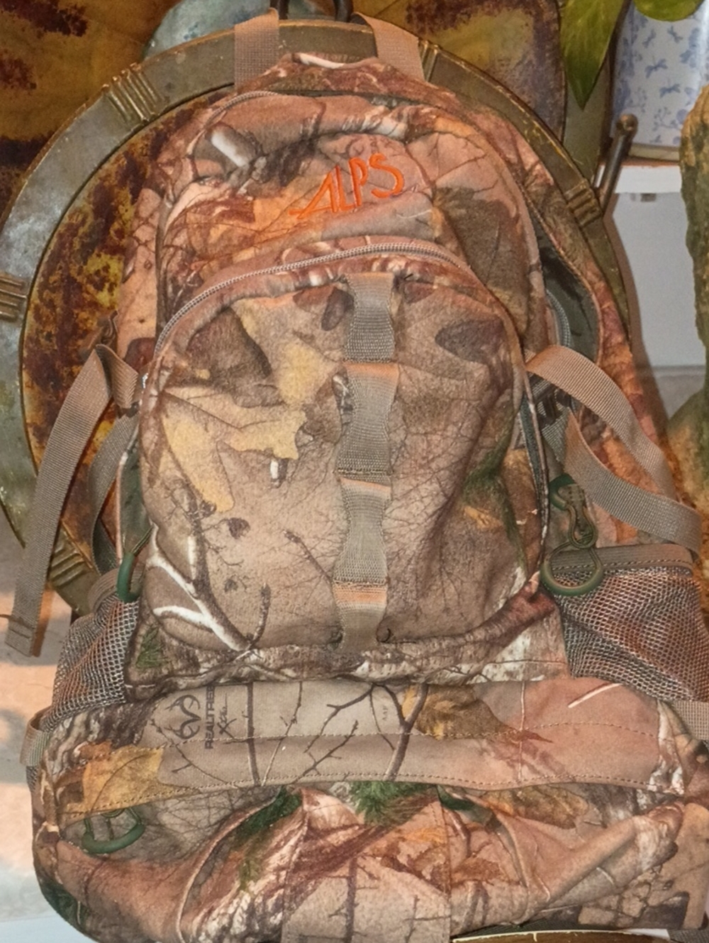 Realtree Men's Camo Backpack in Brown and Green with Orange Logo